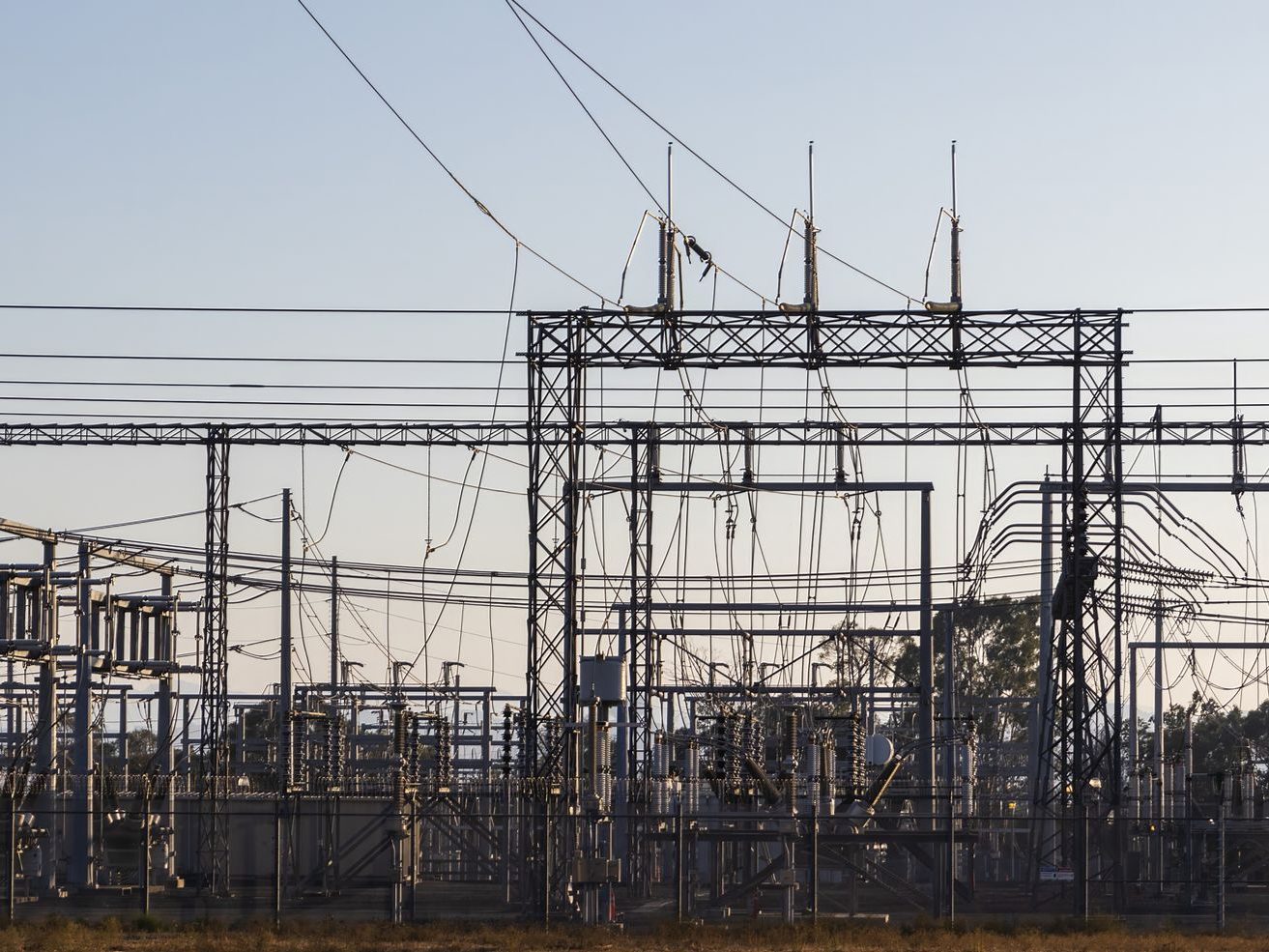 High-voltage substation at dawn